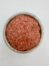 Load image into Gallery viewer, Tiger’s Choice, raw cat food, in silver bowl against a white background.