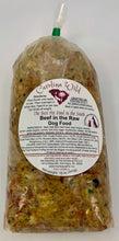 Load image into Gallery viewer, Bag of Carolina Wild raw dog food (beef formula) with a label on a white background
