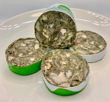 Load image into Gallery viewer, Slices raw green tripe for dogs placed on a white plate, showing highly textured organ.
